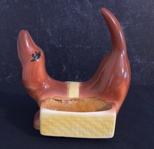 lot 96 image: Mid-Century Dachshund Dresser Caddy, Trinkets, Planter