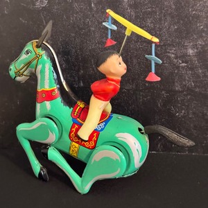 lot 93 image: Vintage Chinese Litho Wind Up Tin Toy Acrobat on Horse