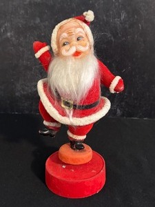 lot 83 image: Vintage Flocked Musical Rotating Santa Clause Figurine