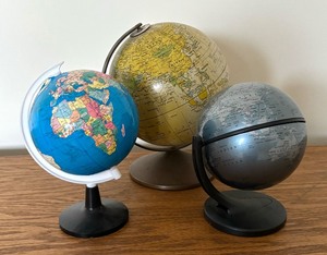 lot 245 image: Three Decorative Globes