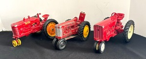 lot 285 image: Three Vintage Toy Tractors by Tru-Schle, Hubley Jr and More