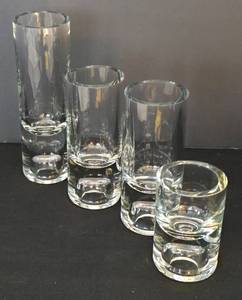lot 403 image: Set of Four Cylindrical Candleholders