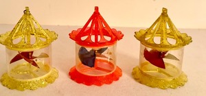 lot 458 image: Three Vintage 1960s Atomic Twirling Christmas Ornaments and One Vintage Diorama Vintage Christmas Ornament
