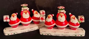 lot 441 image: Pair of Vintage Howard Holt Triple Santa Claus Ceramic Candle Holders