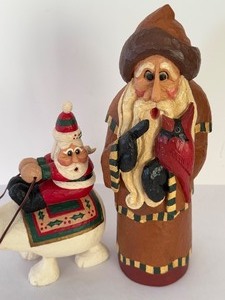 lot 84 image: Two Rodney Wileesberg Figurines including a Rodney Wileesberg Santa Riding Polar Bear Figurine
