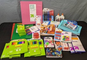 lot 60S image: Assortment of School Supplies Markers, Crayons, Scissors, Dry Erase Markers, Colored Pencils, Elmers Glue, Erasers, Pens, Ruled Index Cards, Sturdy D-Ring Binder, Pocket & Prong Folders, Filler Paper, Primary Composition Notebooks, Etc.
