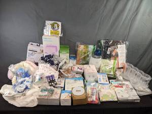 lot 241 image: Large Assortment of BabyPostpartum Products - Car Seat Travel Belt, Pulse Oximeter, Baby EyelashEyelid Cleanser, Breast Pump Flanges, Baby Training ToothbrushToothpaste, Boppy Cover, Baby Yoda Baby on Board Stickers, and More