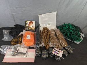 lot 242 image: Assortment of New Wigs and Hair Kossy Springy Afro Twist Hair, Kangaroo Wigs, Multiple Colors and Styles