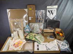 lot 207 image: A Collection of Home Decor Items Including Wall Art, Windchime, Candle Holders and More
