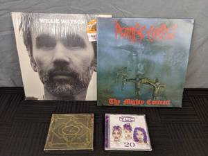 lot 311 image: TLC 20 and DPR Ian Dear Insanity... CDs, Willie Watson Album, and Rotting Christ The Mighty Contract Double Album
