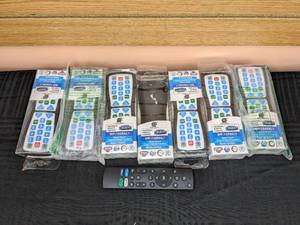 lot 224 image: 8 New TV Remotes Galaxy Matrix Universal Remote Controls and Fire TV Remote
