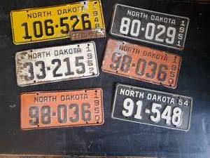 lot 59 image: Fantastic Grouping of Mid Modern North Dakota Liscense Plates