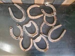 lot 14 image: 10 Real Heavy Used Horseshoes