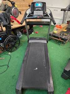 lot 34 image: Nordictrack Treadmill, Model# C950 Pro ( Used, screen broken, Machine works as it should-speed and Incline work)