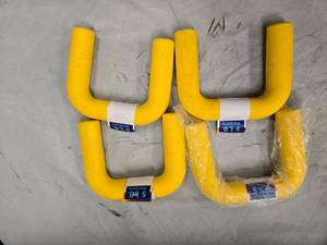 lot 59 image: Lot of Four 5LB  Yellow U-shape Weights