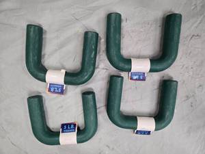 lot 62 image: Lot of Four 5LB  Green U-shape Weights