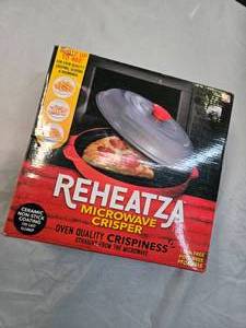 lot 91 image: Reheatza Microwave Crisper ( Oven Quality Crispiness)