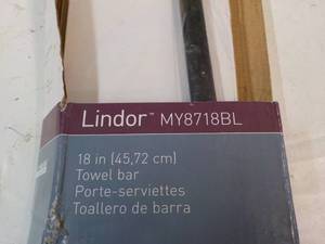 lot 53 image: Lindor 18 Matte Black Towel Bar...