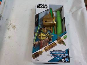 lot 89 image: Star Wars Yoda Light Saber...