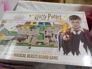 lot 100 image: Harry Potter Magical Beast Board Ga...