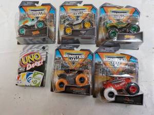 lot 141 image: Monster Jam and UNO Cards...