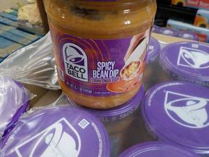 lot 162 image: 12 ct 15.7 oz Taco Bell Spicy Bean ...