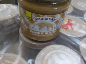 lot 173 image: 12 ct 12 o Jars Smuckers Peanut But...