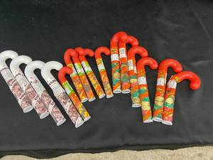 lot 1 image: Lot of 12 Holiday Candy Cane Treats - Reeses and Hersheys Kisses