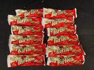 lot 19 image: JJ - Lot of 12 Turtles Caramel Pecan Chocolates - Best by 08262024