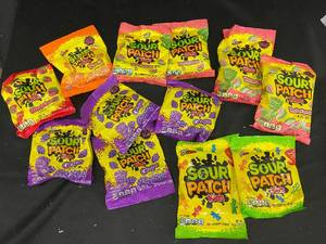 lot 47 image: D - Lot of 12 Sour Patch Kids Candy Bags - Assorted Flavors
