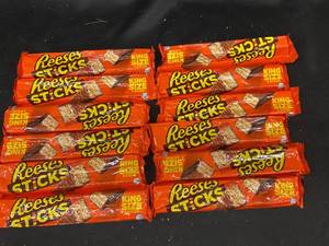lot 74 image: O - Lot of 12 King Size Reeses Sticks Chocolate Bars - Best Before 122024