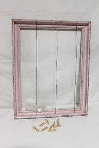 lot 3 image: Vintage Pink Framed Wire Display Board with Wooden Clothespins