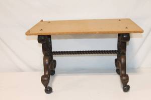 lot 10 image: Vintage Rolling Wooden Table with Decorative Base