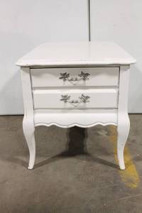 lot 19 image: Vintage White Nightstand with Two Drawers and Decorative Hardware