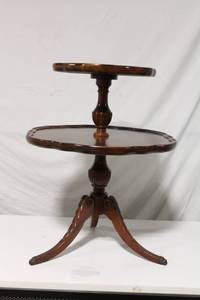 lot 21 image: Vintage Two-Tiered End Table with Elaborate Carvings