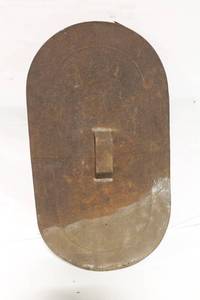 lot 65 image: Vintage Oval Steel Lid with Handle