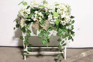 lot 87 image: Decorative White Wicker Plant Stand with Artificial Flowers and Foliage