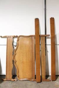 lot 123 image: Vintage Bed Frame with Intricate Scalloped Edges and Decorative Legs