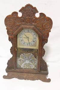 lot 141 image: Vintage Carved Wooden Clock with Decorative Glass Face
