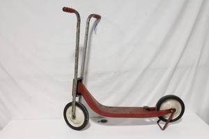 lot 173 image: Vintage Red Scooter with Dual Handlebars and Ball Bearings