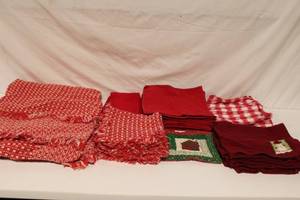 lot 237 image: Assorted Collection of Red Kitchen Linens Including Dish Towels, Checkered Napkins, and Pot Holder
