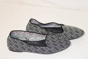 lot 412 image: Skechers Air-Cooled Memory Foam Slip-On Flats in Black and White Pattern - Size 7