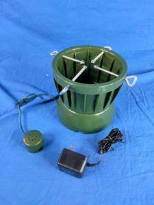 lot 202 image: Northlight Seasonal 24 Green Musical Rotating Christmas Tree Stand