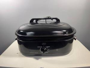 lot 23 image: Oster CKSTRS18-BSB-V 18-Quart Roaster Oven with Keep Warm and Defrost Functions