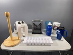 lot 41 image: Assorted Kitchen Items Including Toaster, Bagel Slicer, Ice Tray, Paper Towel Holder and More