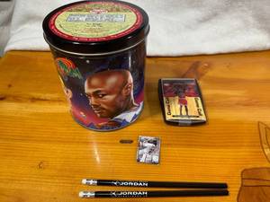 lot 79 image: Space Jam Collectors Tin with Michael Jordan Items and Pencils