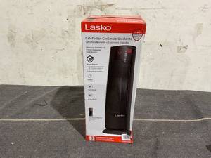 lot 122 image: Lasko 22 1500W Oscillating Ceramic Tower Space Heater with Remote