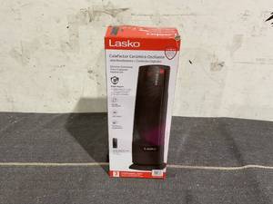lot 140 image: Lasko 22 1500W Oscillating Ceramic Tower Space Heater with Remote