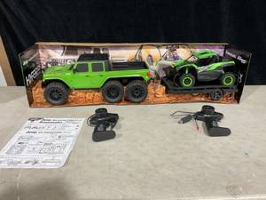 lot 416 image: Hyper Toys Company 110 Six Wheel RC Jeep with Trailer and Kawasaki KRX RC