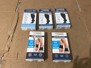 lot 287 image: LOT of 3 Copper Fit Compression Socks and LOT of 2 Copper Fit Arch Relief Compression Bands